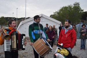 No Borders Kitchen Volunteers entertaining the refugees